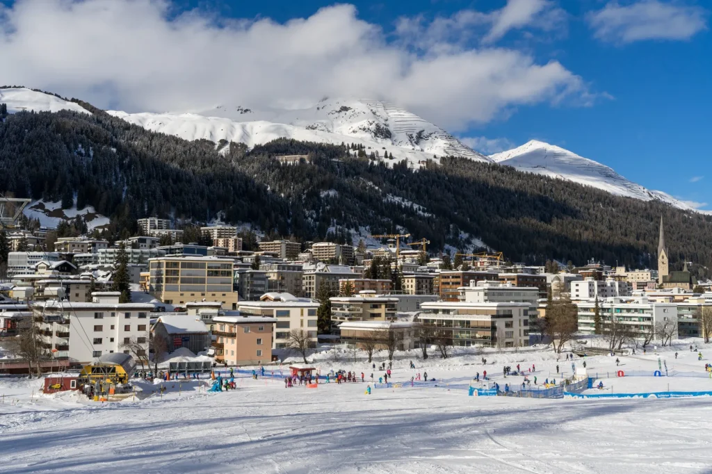 Sunny Winter Day in Davos. View from slope over Davos-platz